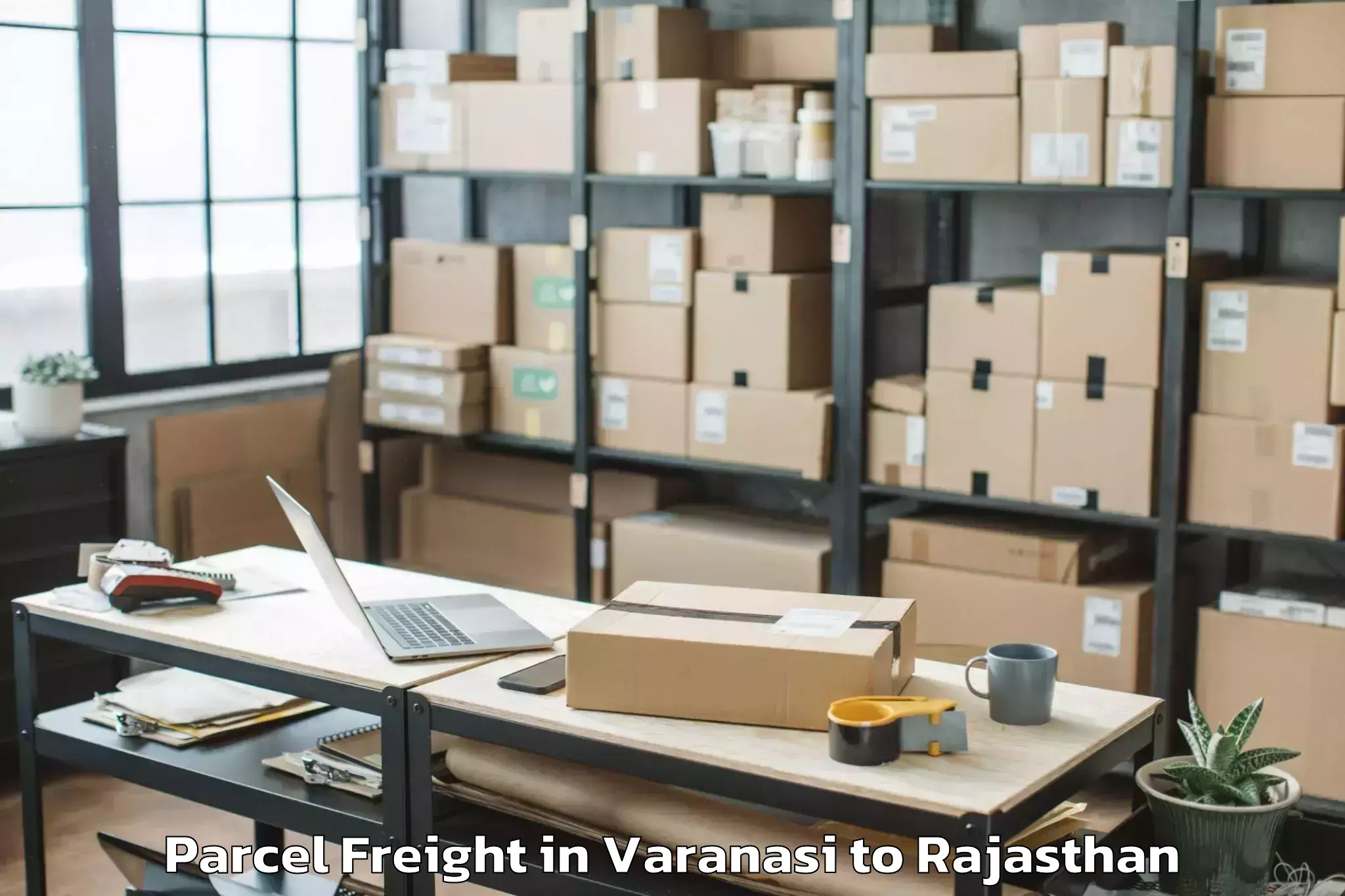 Varanasi to Jalor Parcel Freight